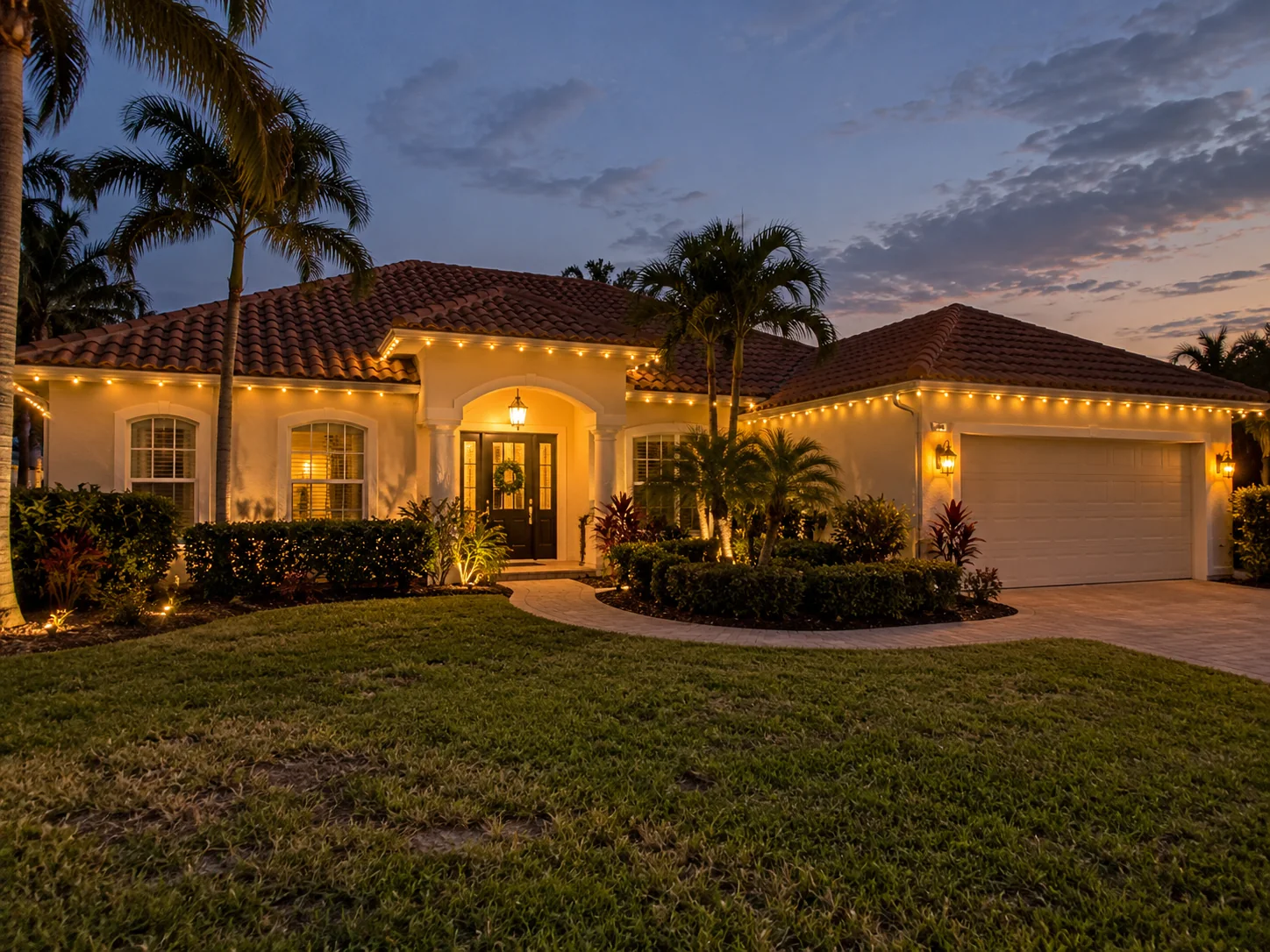 Illustrative Christmas lighting design on a Venice-style coastal home